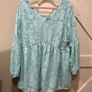 Lane Bryant mint green beautiful top. Pit 22” flat. Length 31”.